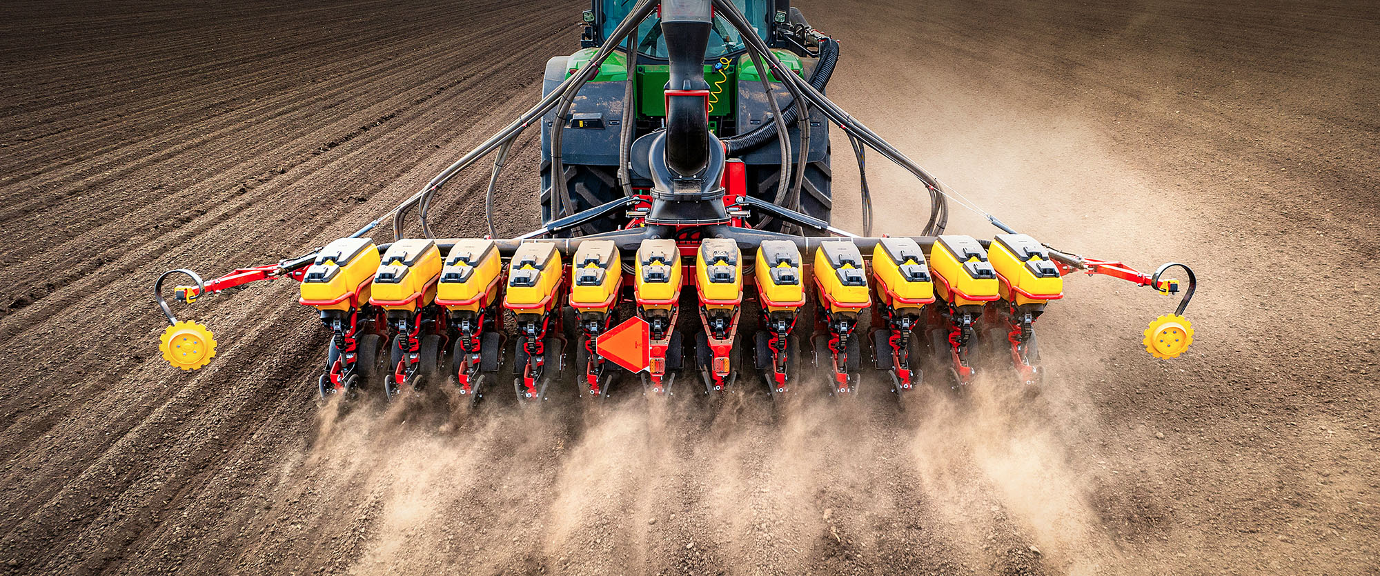 Väderstad Tempo V 12 rows in field during sunrise