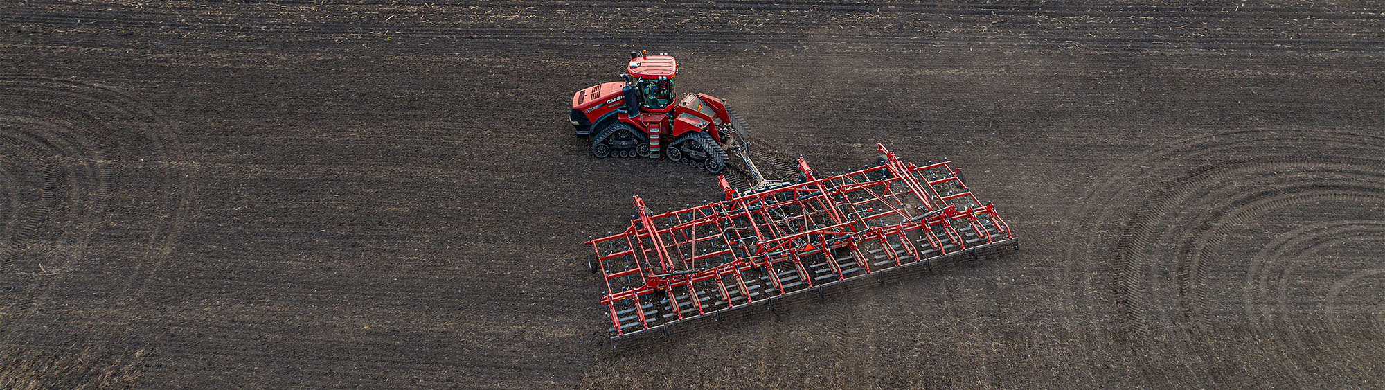 Aerial photo of a Wil-Rich field cultivator working in a field